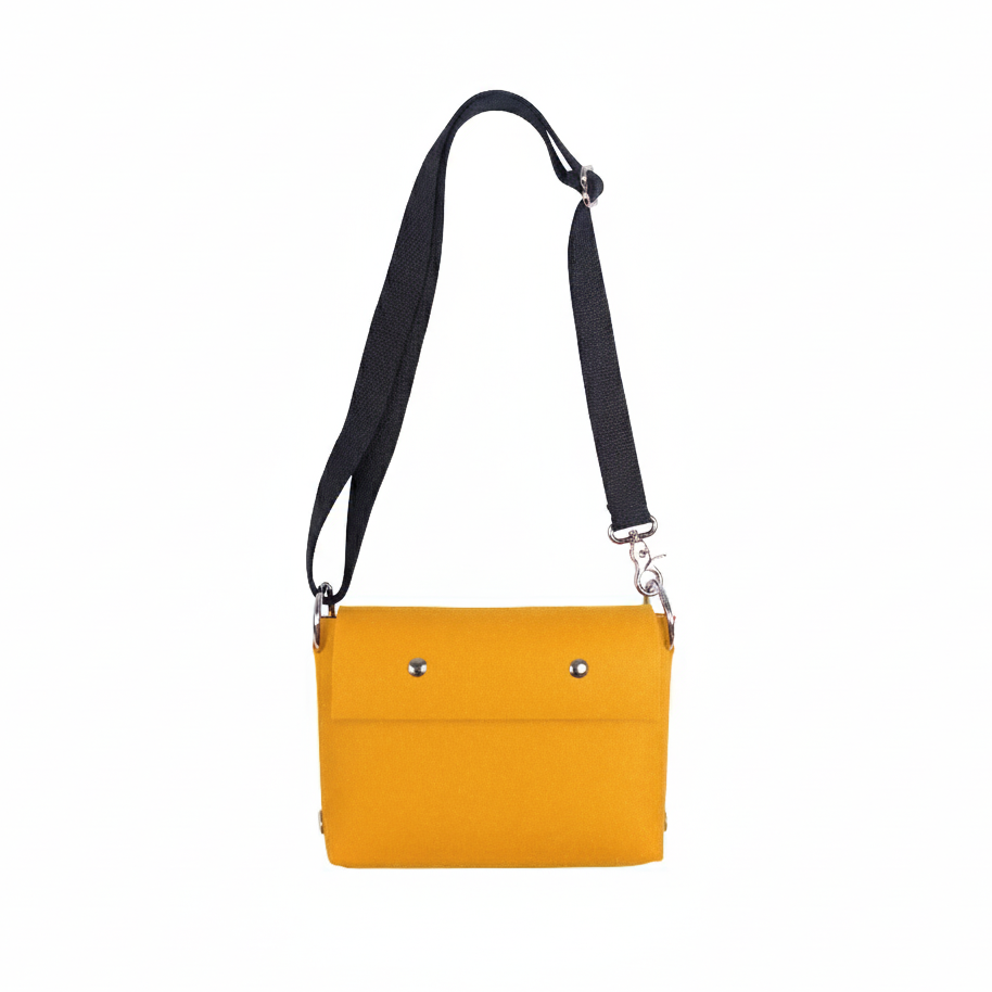 Yellow crossbody bag with a black strap on a white background