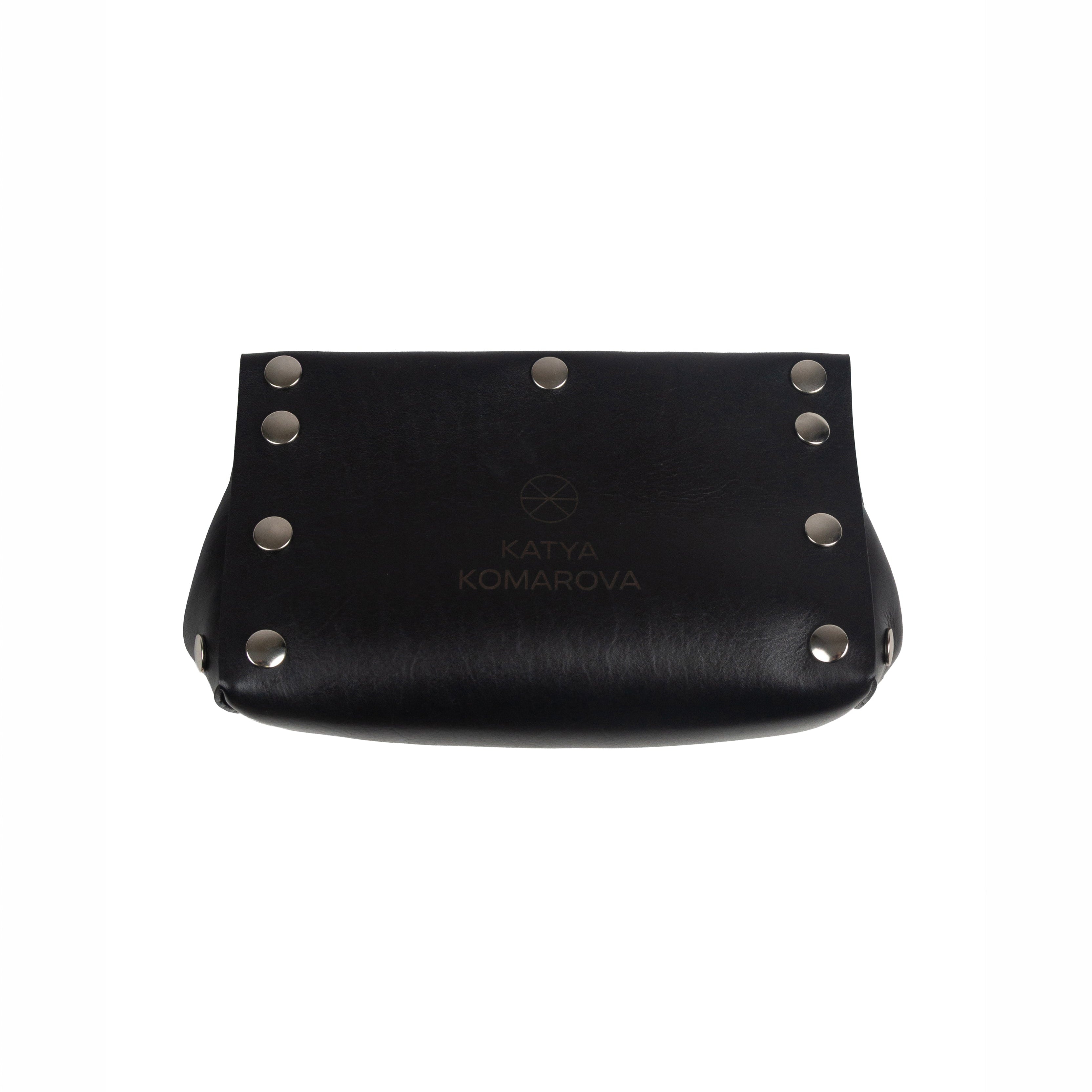 Black leather pouch with silver studs on a white background